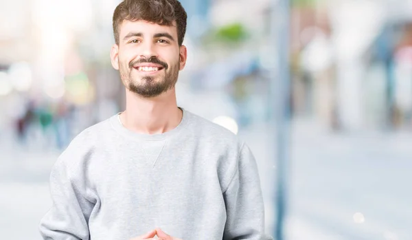 Joven Hombre Guapo Con Sudadera Sobre Fondo Aislado Las Manos —  Fotos de Stock