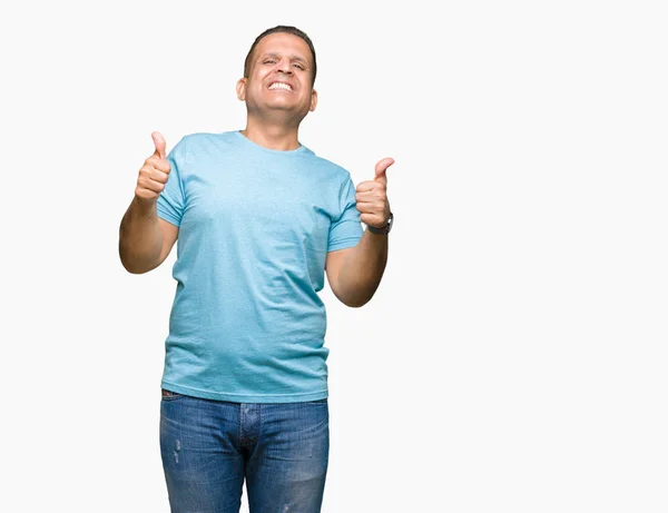Medelåldern Arabiska Mannen Klädd Blå Shirt Över Isolerade Bakgrund Framgång — Stockfoto