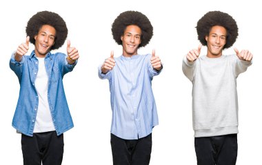 Beyaz izole arka plan onaylama üzerinde afro saçlı Genç adam kolaj el ile olumlu hareketi yapıyor gülümseyen ve başarı için mutlu yaşasın. Kamera, kazanan jest arıyorsunuz.