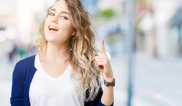 Beautiful Young Blonde Woman Isolated Background Pointing Finger Successful Idea — Stock Photo, Image