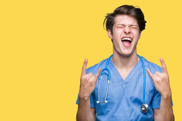 Young Doctor Wearing Medical Uniform Isolated Background Shouting Crazy Expression — Stock Photo, Image