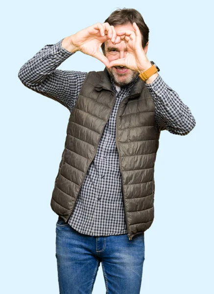 Middle Age Handsome Man Wearing Winter Vest Doing Heart Shape — Stock Photo, Image