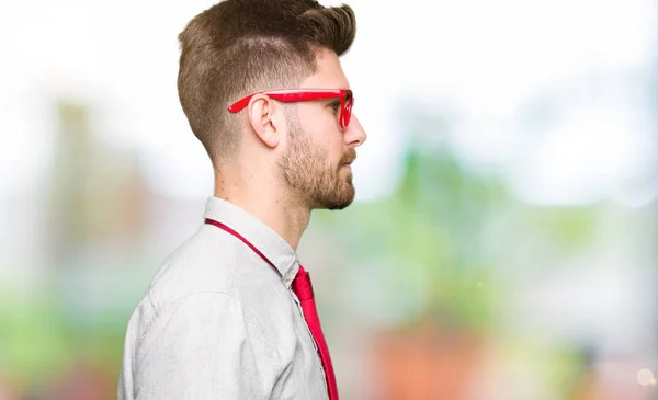 Young Handsome Business Man Wearing Glasses Looking Side Relax Profile — Stock Photo, Image