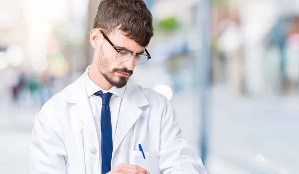 Young Professional Scientist Man Wearing White Coat Isolated Background Checking — Stock Photo, Image