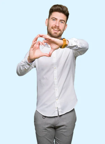 Jonge Knappe Zakenman Glimlachend Liefde Met Hartsymbool Vorm Met Handen — Stockfoto