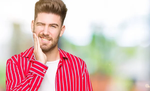 Young Handsome Man Wearing Red Shirt Touching Mouth Hand Painful — Stock Photo, Image