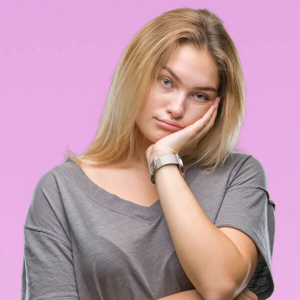 Young caucasian woman over isolated background thinking looking tired and bored with depression problems with crossed arms.