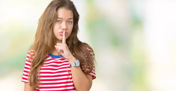 Jonge Mooie Brunette Vrouw Dragen Strepen Shirt Geïsoleerde Achtergrond Vragen — Stockfoto