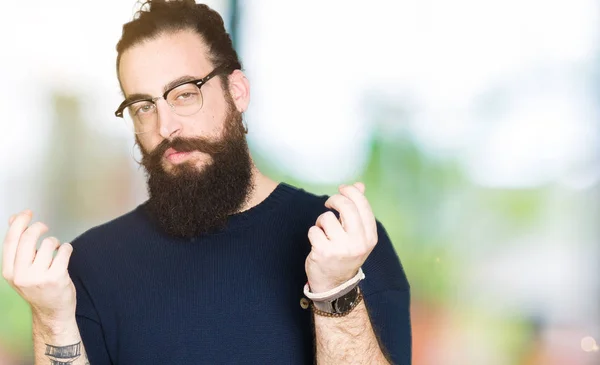 Young Hipster Man Long Hair Beard Wearing Glasses Doing Money — Stock Photo, Image