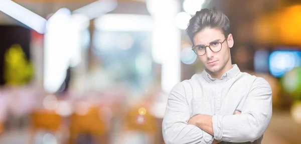 Joven Hombre Guapo Con Gafas Sobre Fondo Aislado Escéptico Nervioso —  Fotos de Stock