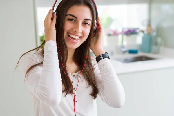 Beautiful Young Woman Wearing Headphones Listening Music Enjoying Dancing Happy — Stock Photo, Image