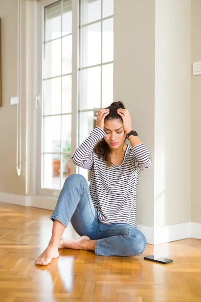 Young Beautiful Woman Sitting Floor Home Suffering Headache Desperate Stressed — Stock Photo, Image