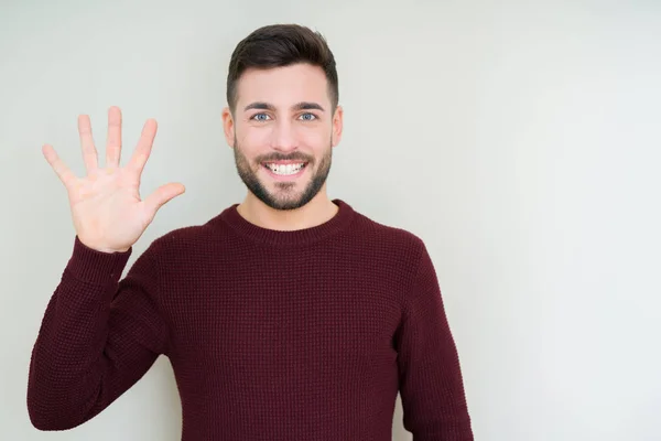 Jovem Homem Bonito Vestindo Uma Camisola Sobre Fundo Isolado Mostrando — Fotografia de Stock