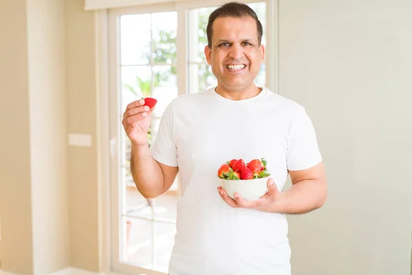 Middle Age Man Eating Straweberry Home — Stock Photo, Image