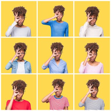 Sarı izole arka plan üzerinde genç güzel Afrikalı kız kolaj sürpriz yüz, göz parmaklar ile bakarak şok ok jest yapıyor. İnanılmaz ifade.