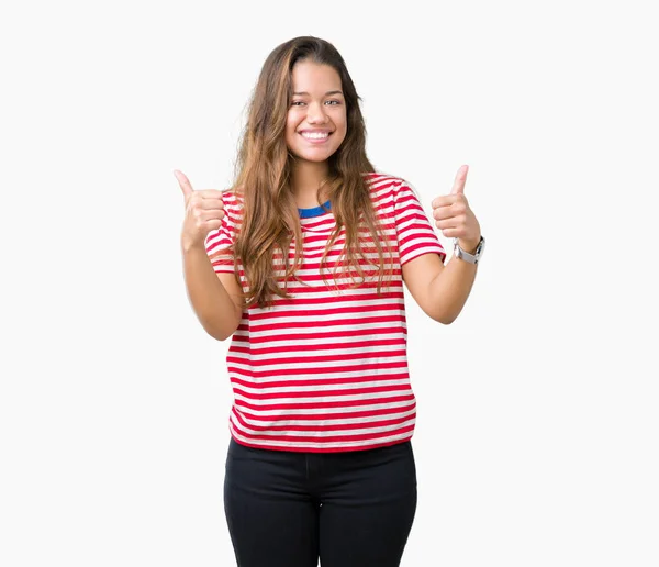 Młoda Piękna Brunetka Kobieta Noszenie Paski Shirt Nad Znakiem Sukcesu — Zdjęcie stockowe