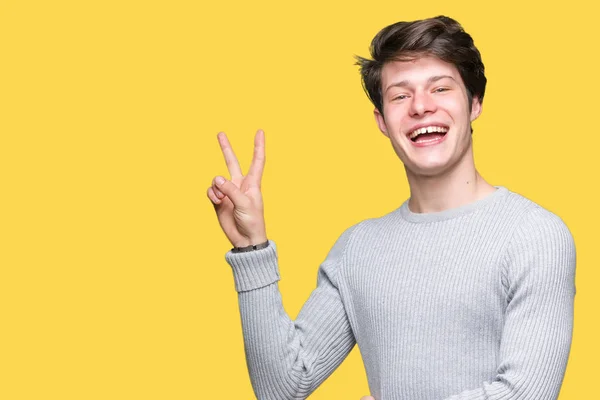 Jovem Homem Bonito Usando Camisola Inverno Sobre Fundo Isolado Sorrindo — Fotografia de Stock