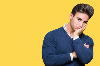 Genç yakışıklı iş adamı izole arka plan düşünme seyir üzerinde yorgun ve sıkılmış çapraz silah depresyon sorunları ile.