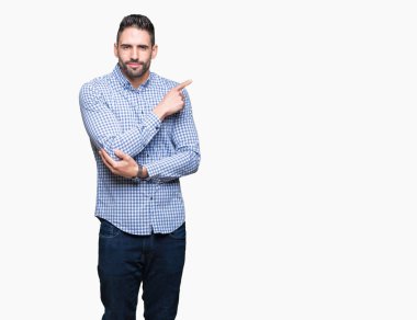 Yakışıklı delikanlı izole üzerinden reklam, ciddi ve sakin yüz gösterilen yan el parmak ile işaret arka plan