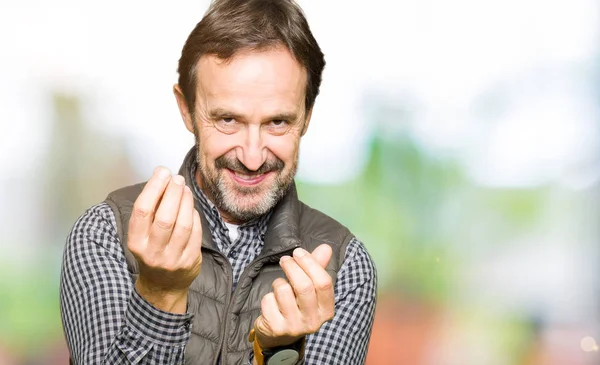 Middle Age Handsome Man Wearing Winter Vest Doing Money Gesture — Stock Photo, Image
