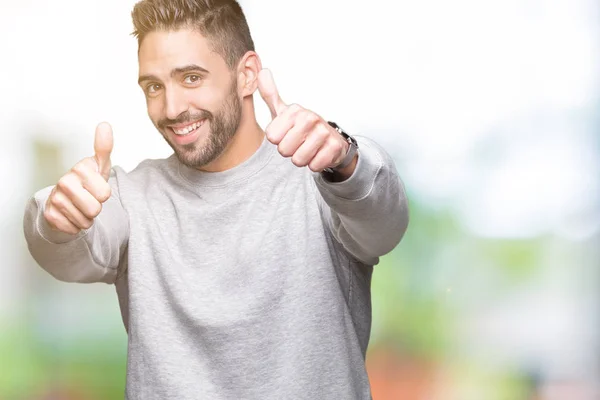 Homem Bonito Jovem Vestindo Camisola Sobre Fundo Isolado Aprovando Fazer — Fotografia de Stock