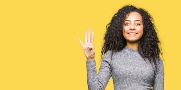 Young Beautiful Girl Curly Hair Showing Pointing Fingers Number Four — Stock Photo, Image