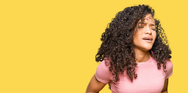 Young Beautiful Woman Curly Hair Wearing Pink Shirt Hand Stomach — Stock Photo, Image