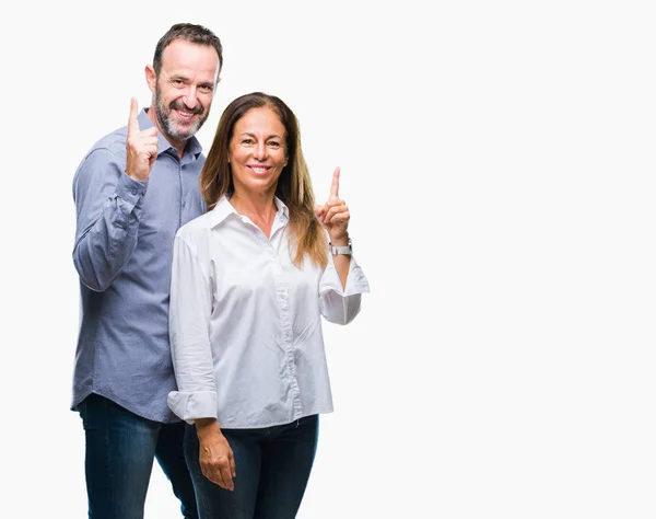 Medelåldern Hispanic Business Par Över Isolerade Bakgrund Pekande Finger Upp — Stockfoto