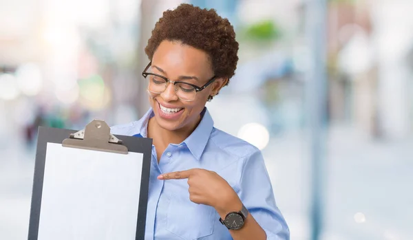 Young African American Businesss Woman Holding Clipboard Isolated Background Very — Stock Photo, Image
