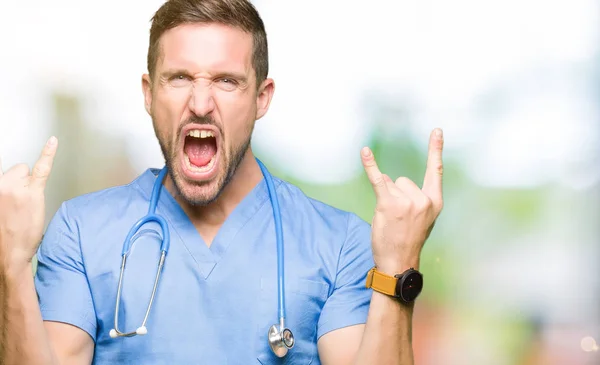 Handsome Doctor Man Wearing Medical Uniform Isolated Background Shouting Crazy — Stock Photo, Image