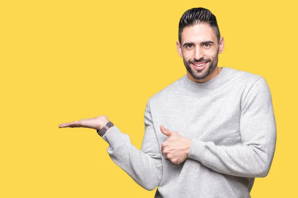 Young Handsome Man Wearing Sweatshirt Isolated Background Showing Palm Hand — Stock Photo, Image