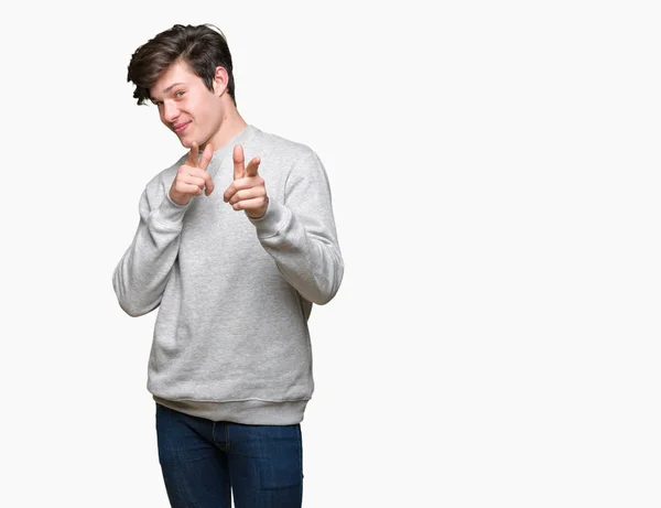 Young Handsome Sporty Man Wearing Sweatshirt Isolated Background Pointing Fingers — Stock Photo, Image