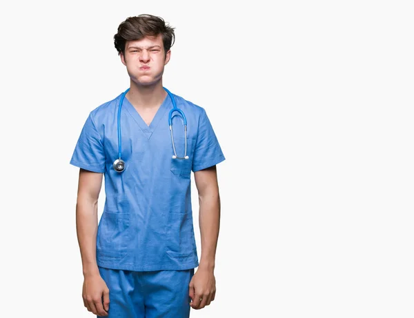 Unga Läkare Bär Medicinsk Uniform Över Isolerade Bakgrund Pustande Kinder — Stockfoto