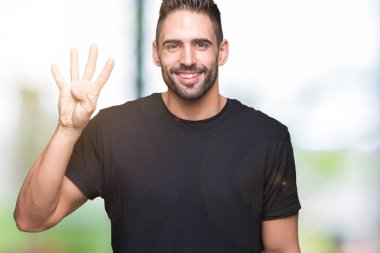 Yakışıklı delikanlı gösterilen ve parmakları ile işaret izole arka plan üzerinde dört kendinden emin ve mutlu gülümseyerek iken numara.