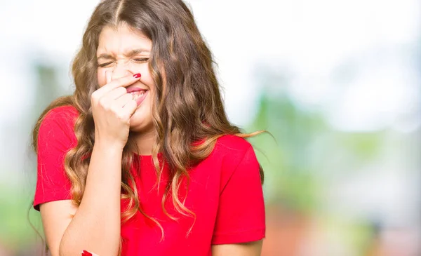 Young Beautiful Woman Wearing Casual Shirt Smelling Something Stinky Disgusting — Stock Photo, Image