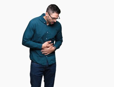 Üzerinde gözlük takan genç yakışıklı iş adamı izole mide üzerinde el ile arka plan çünkü hazımsızlık, ağrılı hastalık hasta hissediyor. Ağrısı kavramı.