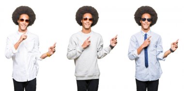 Gülümseyen ve iki elleri ve parmakları ile tarafına işaret kamera bakıyor beyaz izole arka plan üzerinde afro saçlı genç adam kolaj.
