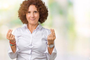 El ile maaş ödeme için milyoner iş soran jest güzel orta ager üst düzey businees kadın izole arka plan yapıyor para üzerinden