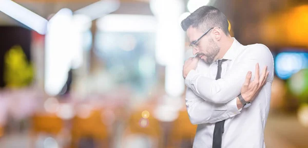 Young Handsome Business Man Wearing Glasses Isolated Background Hugging Oneself — Stock Photo, Image