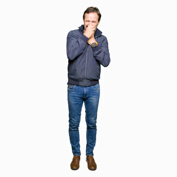 Middle Age Handsome Man Wearing Jacket Smelling Something Stinky Disgusting — Stock Photo, Image