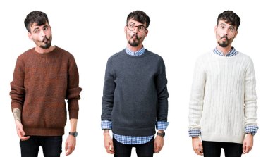 Genç adam kolaj dudaklar, çılgın ve komik jest ile balık yüz yapma izole arka plan üzerinde bir kazak giyiyor. Komik ifade.