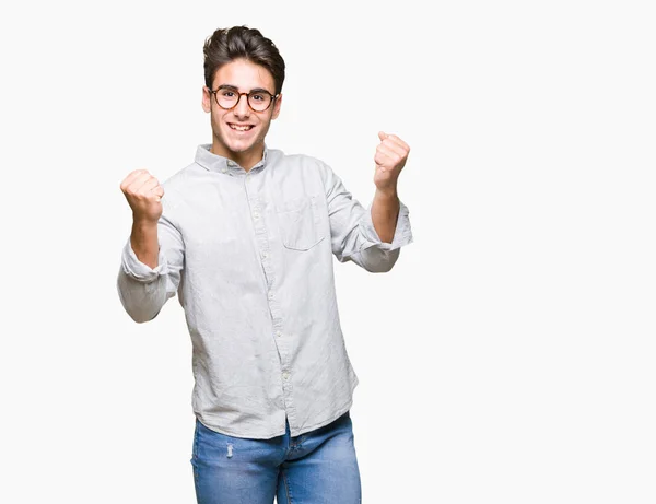 Young Handsome Man Wearing Glasses Isolated Background Celebrating Surprised Amazed — Stock Photo, Image