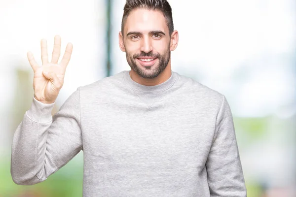 Junger Gutaussehender Mann Der Sweatshirt Über Isoliertem Hintergrund Trägt Und — Stockfoto