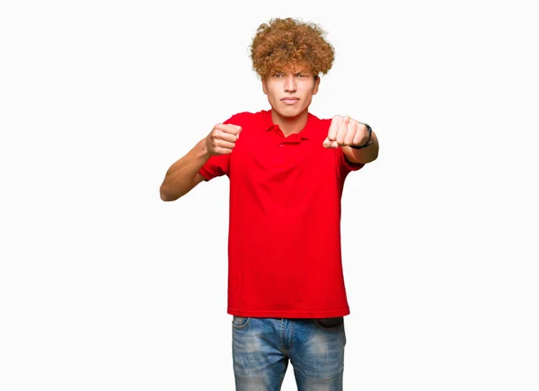 Young Handsome Man Afro Hair Wearing Red Shirt Punching Fist — Stock Photo, Image