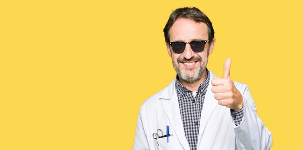 Handsome Middle Age Doctor Man Wearing Sunglasses Doing Happy Thumbs — Stock Photo, Image