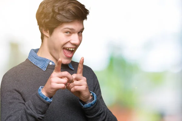 Joven Hombre Elegante Guapo Sobre Fondo Aislado Señalando Los Dedos — Foto de Stock