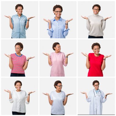 İzole arka plan üzerinde afro saç ile genç Afrikalı Amerikan kadın hem eller açık avuç içi gösteren gülümseyen, sunma ve reklam karşılaştırma ve denge