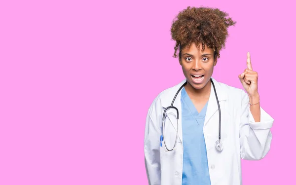 Young African American Doctor Woman Isolated Background Pointing Finger Successful — Stock Photo, Image