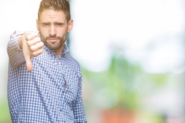 Joven Hombre Guapo Sobre Fondo Aislado Buscando Infeliz Enojado Mostrando —  Fotos de Stock