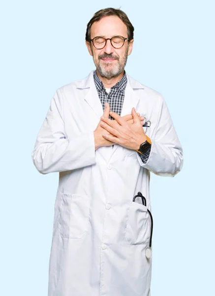 Middle Age Doctor Men Wearing Medical Coat Smiling Hands Chest — Stock Photo, Image